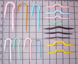 Vari tipi di ferretto per trecce