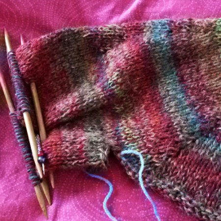 Una manica spunta dal maglione